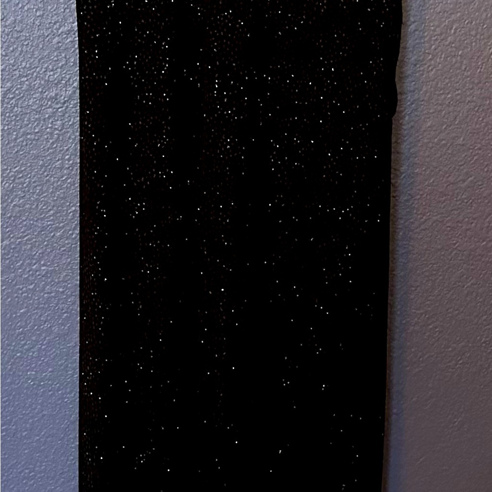 Long, slinky black glitter formal dress.